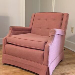 Pair of pink mid century armchairs with tufted backs