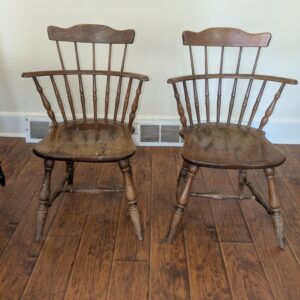Pair of antique oak spindle back chairs with curved arms