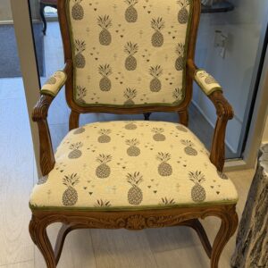 Wood armchair with pineapple-pattern fabric